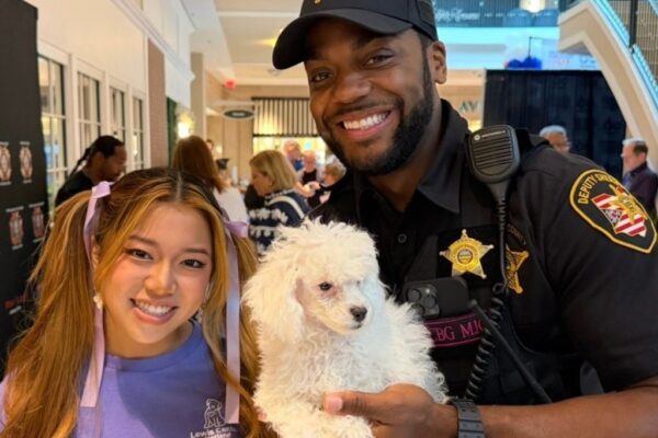 Petland Lewis Center at the ABC Veterans Expo with a local officer